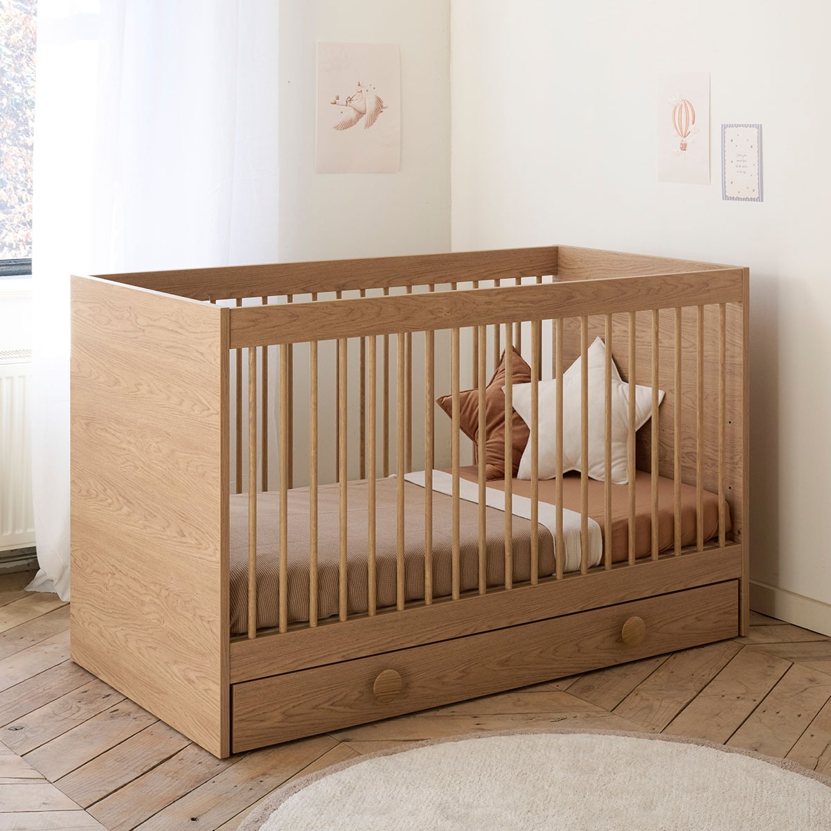 Natural oak wood convertible cot bed in vintage design for lasting nursery style