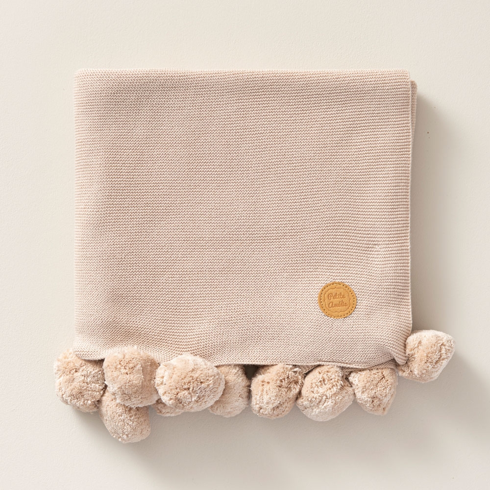 Effen organisch katoenen ledikantdeken met pompons 100x150 cm | Zand roze / taupe