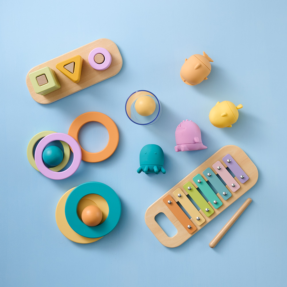 Organized Montessori toy rotation display with 16-18 month learning toys