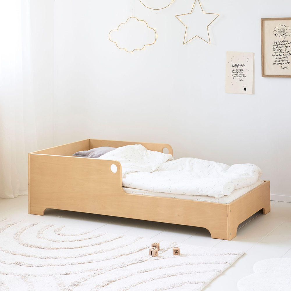 Ellipse montessori floor bed in natural wood for safe bedroom setup