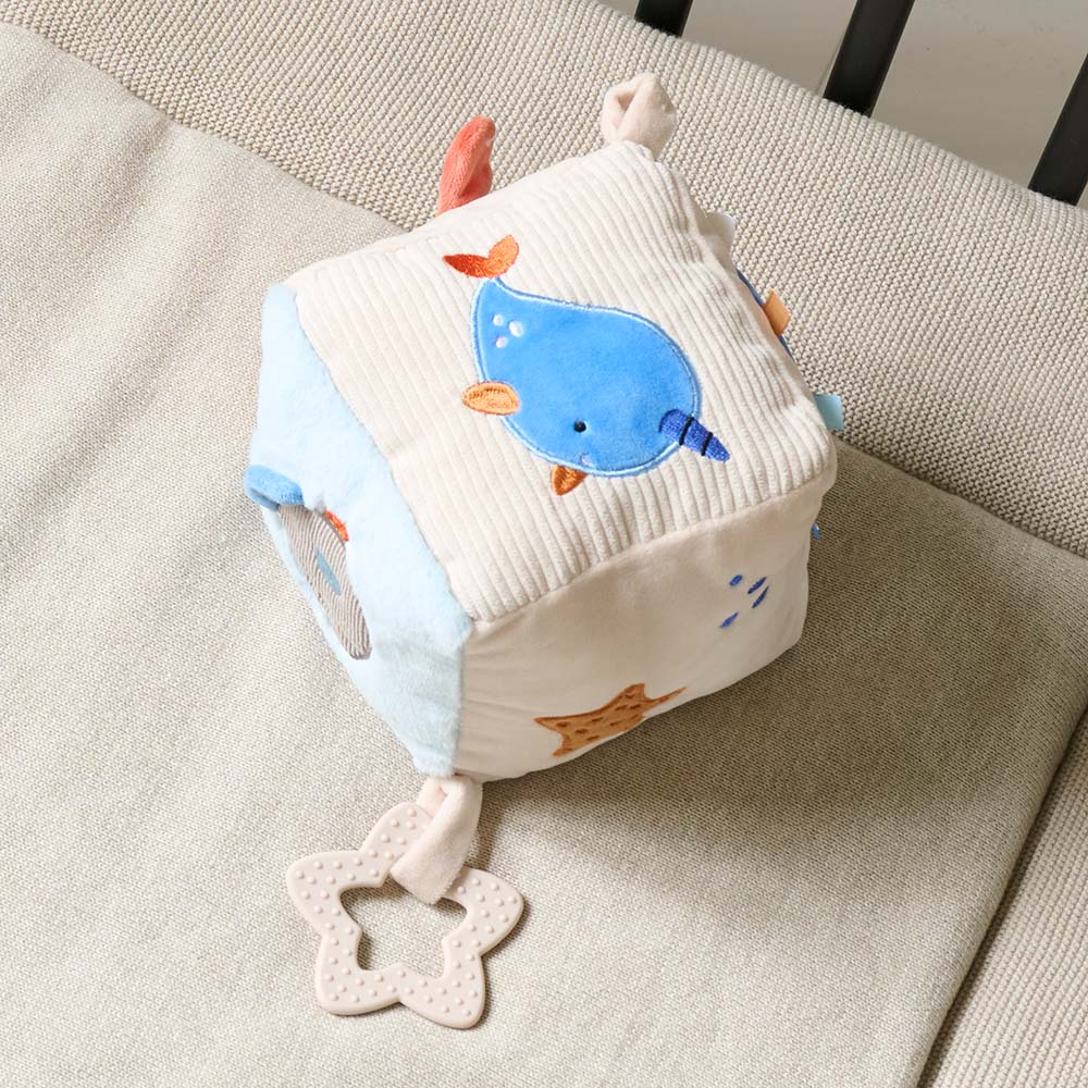 Baby activity cube with teething ring and sea-life toys for sensory play